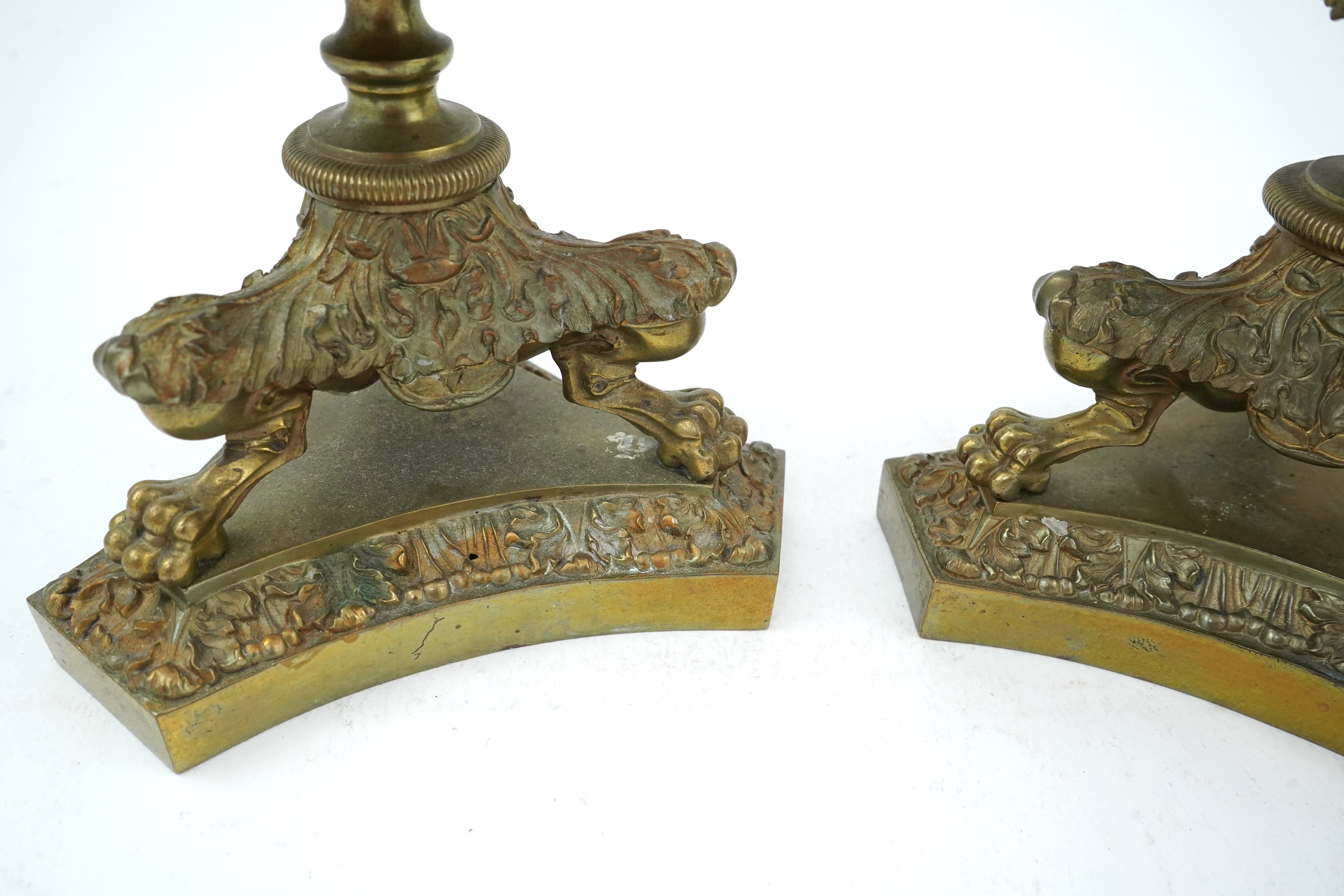 A pair of Empire style ormolu storm lanterns, 19th century